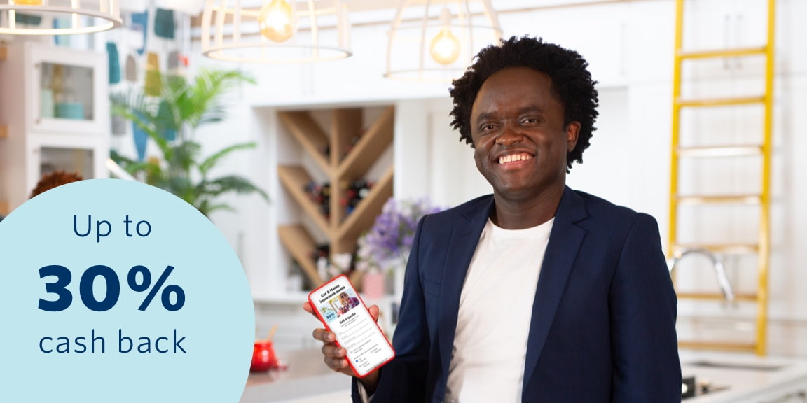 A man in the safety of his home, showcasing safety features such as Safety Alert which are available on the Momentum App.