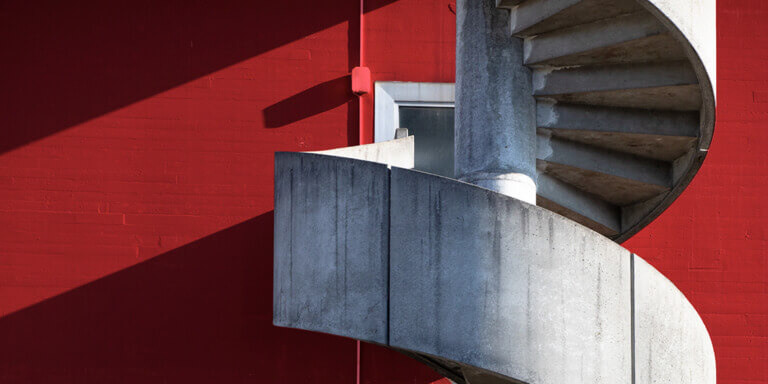 Concrete stairs in a spiral shape.
