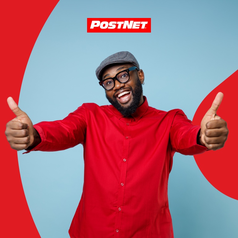 Happy young man dressed in a red shirt showcasing an exciting free will offer.