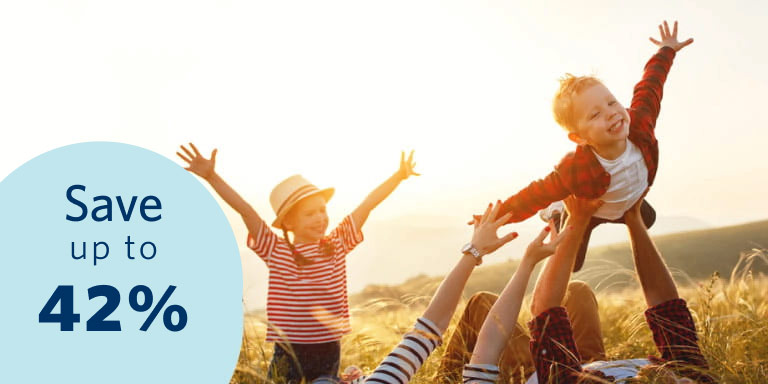 A young healthy family consisting of a couple, a son and a daughter enjoying the outdoors. Save up to 42% with Momentum Medical Scheme.