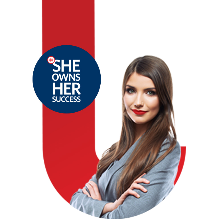 A #SheOwnsHerSuccess poster featuring a long-haired brunette lady in red lipstick and crossing her arms.